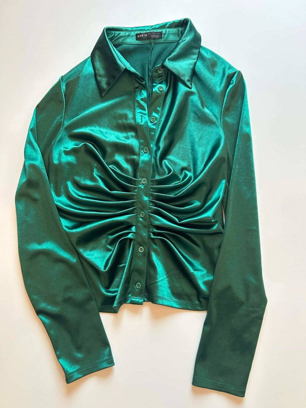 Ladies' green button down top.